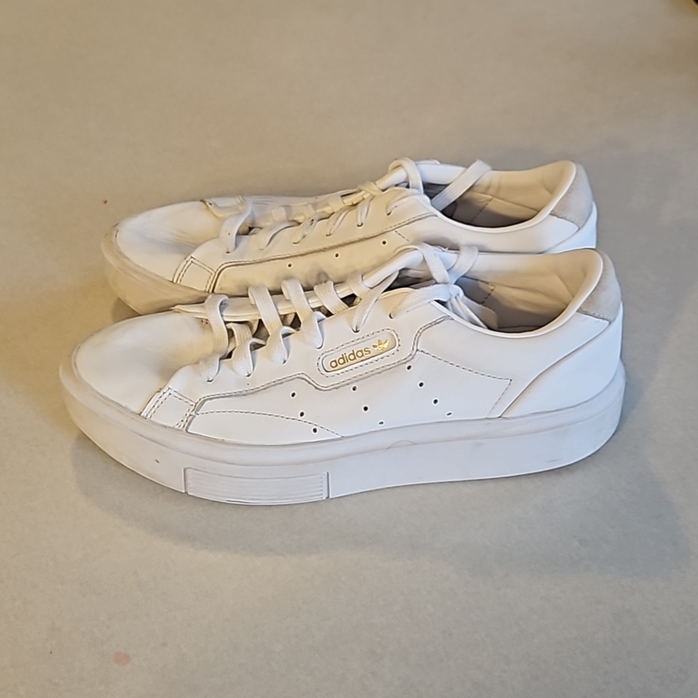 Adidas sleek white platform sneakers